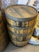 Large coopered oak barrel.