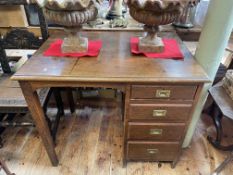 Early 20th Century oak four drawer single pedestal desk, 76cm by 91cm by 64cm.
