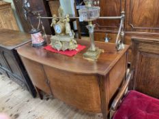 19th Century mahogany and line inlaid two door bow front sideboard with brass rail back,