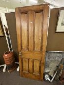Two pine panelled doors, 198cm by 75cm.