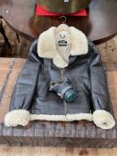 US Army style Air Force sheepskin flying jacket, HPS number 045834134, size 40, and a gas mask.