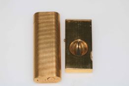 Cartier lighter, number 21880L, and cigar cutter (2).