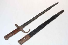 Middle Eastern bayonet with scabbard, blade 46cm length.