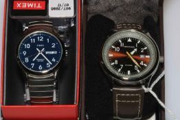Two boxed gents Timex and Sekonda wristwatches.
