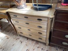 Shaped front pine chest of four long drawers, 86.5cm by 101cm by 55cm.