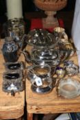 Collection of silver plated wares including tea set, cocktail shaker, biscuit jar, etc.