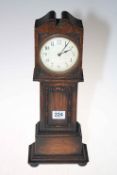 Oak miniature longcase clock.