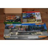 Hornby Caledonian Local, and another boxed railway, together with train accessories, loose in box.