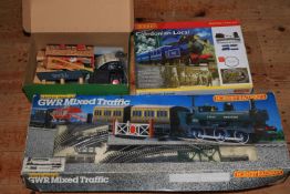Hornby Caledonian Local, and another boxed railway, together with train accessories, loose in box.