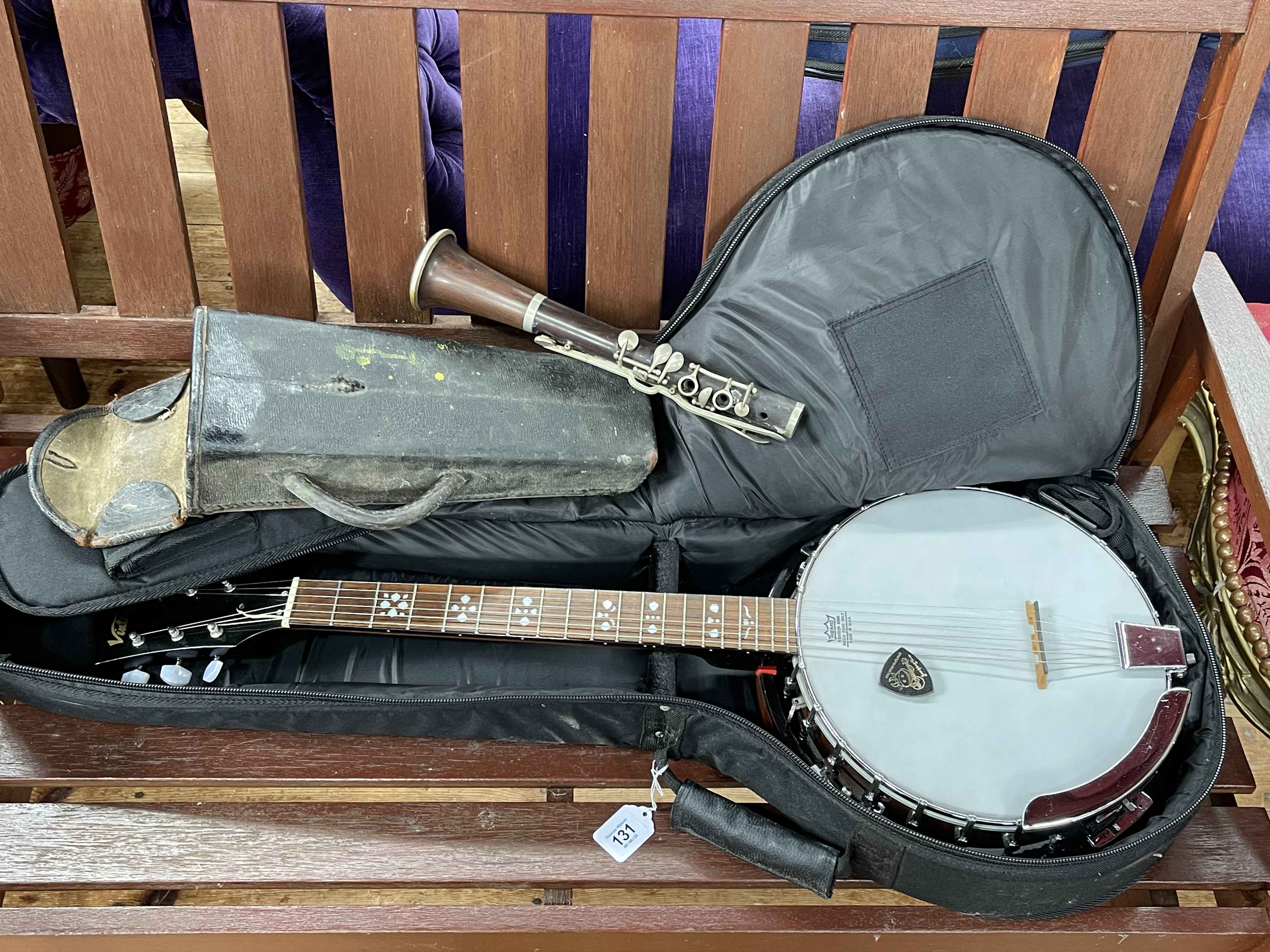 Remo mother of pearl inlaid banjo, clarinet and a Hohner Student II accordion in case.