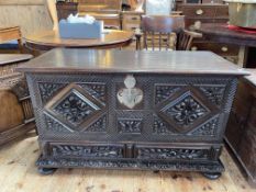 Carved oak two drawer coffer, 66cm by 106cm by 45cm.