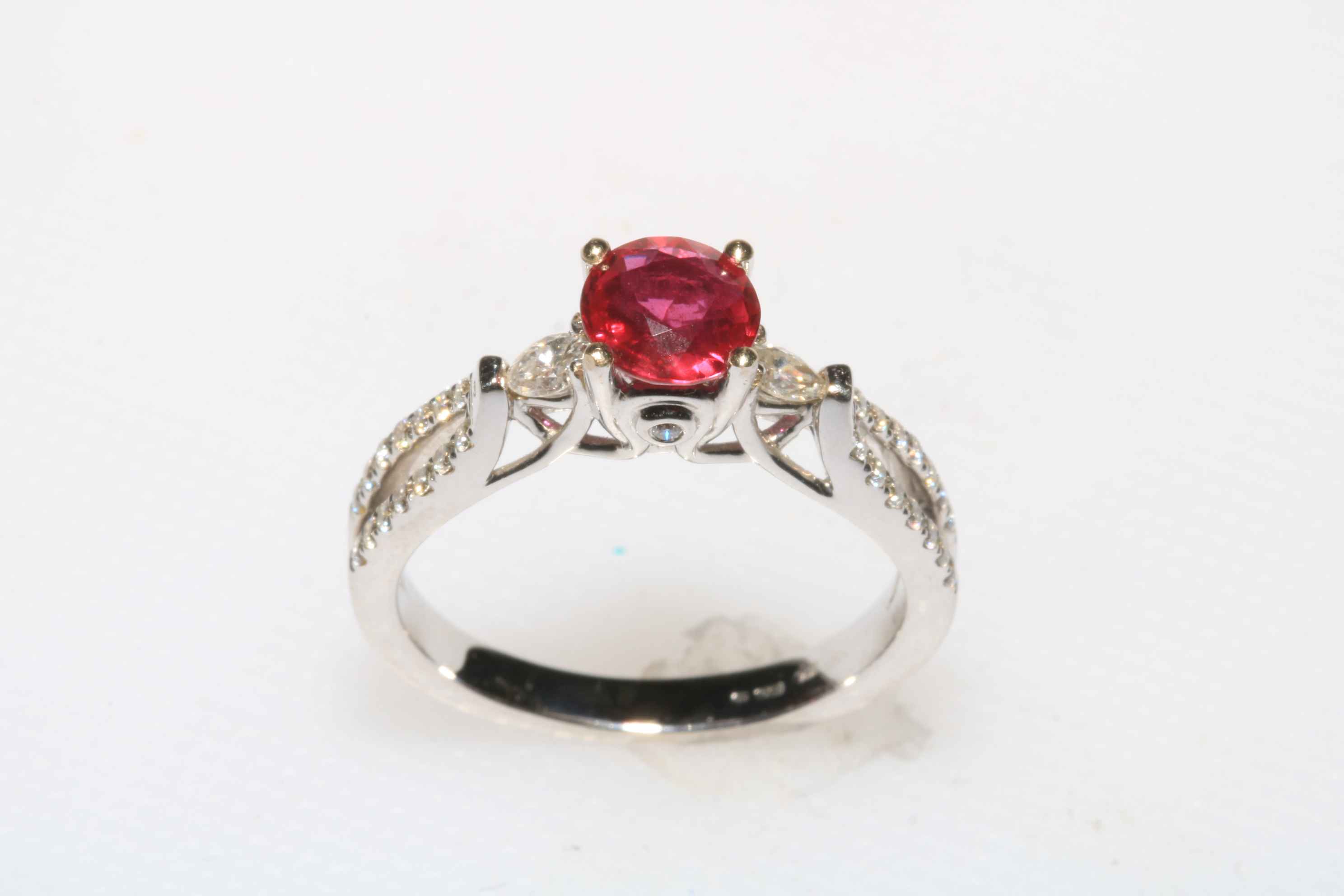 18 carat white gold, oval ruby and diamond ring, ruby 0.86 carat, total diamond weight 0. - Image 2 of 2