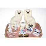 Pair of Staffordshire dogs, three Victorian fairings, pair of figures,
