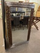 Bronze coloured framed rectangular bevelled wall mirror, 142cm by 80.5cm overall.