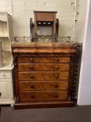 Victorian mahogany chest of six long drawers, mahogany cabriole leg dining table, two brass fenders,
