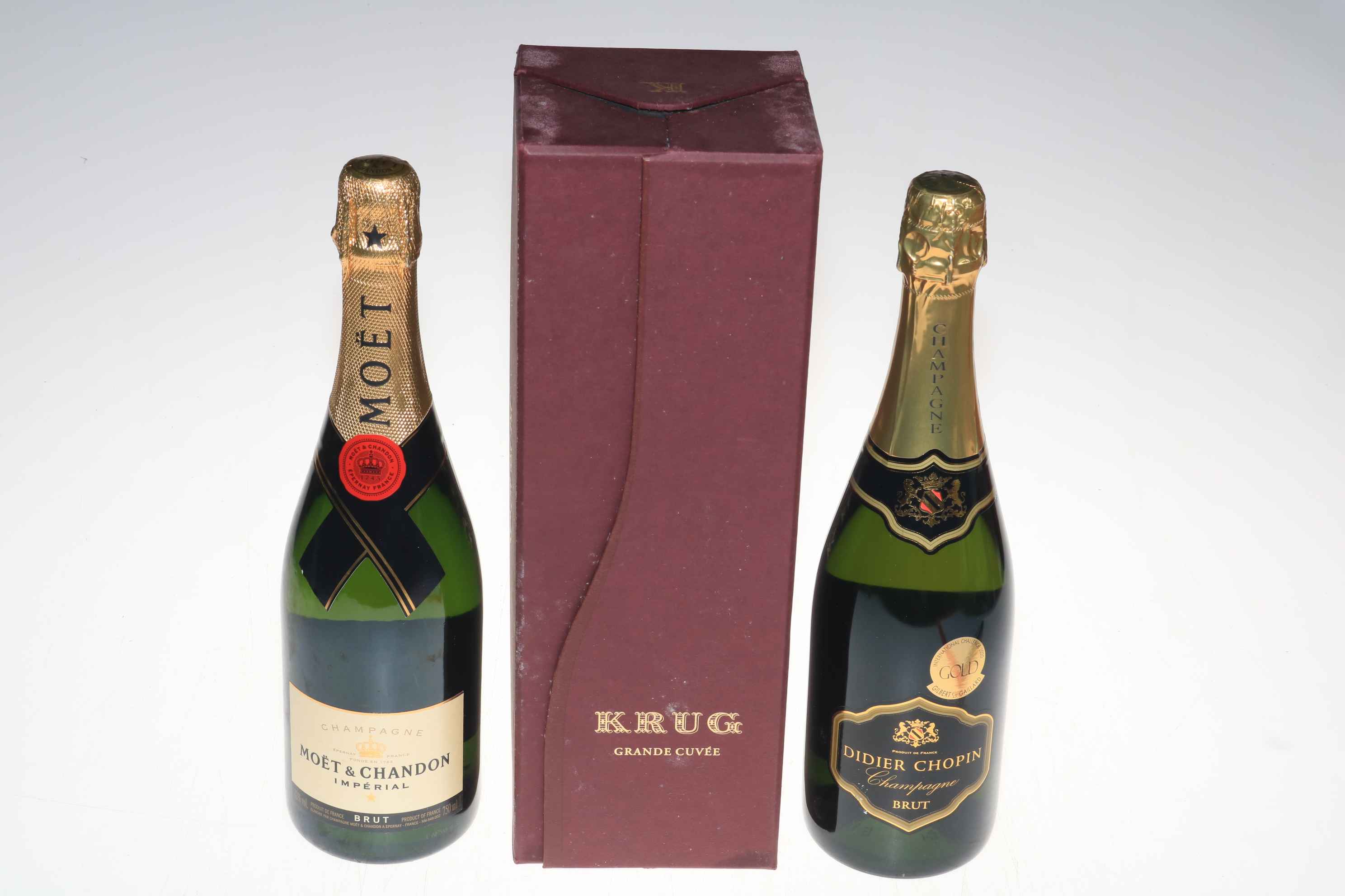 Krug Grand Cuvee champagne, boxed, and Moet and Didier Chopin champagne (3 bottles).