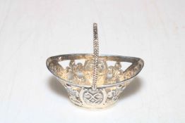 Antique Continental silver miniature basket bearing import assay for London 1904, 7.5cm across.