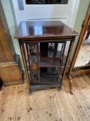 Unusual Edwardian mahogany and line inlaid two tier bookcase with revolving centre, 91cm by 53.
