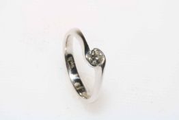 Diamond solitaire and 9 carat white gold ring, size M.