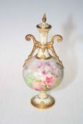 Royal Doulton vase and cover painted with flowers, signed P. Curnock, 26cm.