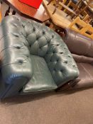 Bottle green buttoned leather Chesterfield chair.
