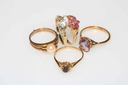 Collection of five 9 carat gold gem set rings.
