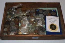 Tray of coins and tokens.
