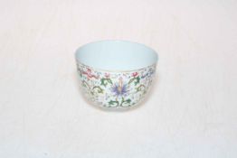 Chinese famille rose tea bowl with formal decoration, six character mark, 9.5cm diameter.