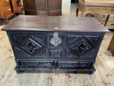 Carved oak two drawer coffer, 66cm by 106cm by 45cm.