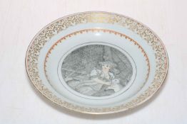 Chinese plate decorated with European lady with lamb, gilt border, 23cm diameter.