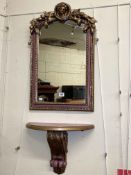 Gilt painted and blush demi lune wall shelf and matching wall mirror.