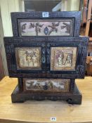 Chinese black lacquered table cabinet having two drawers and two cupboard doors with figure