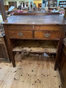 Victorian pitch pine two drawer clerks desk, 120cm by 106cm by 63cm.