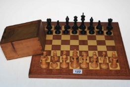 Weighted chess set and board.