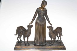 Bronze metal Art Deco style lady with two dogs.