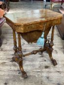 Victorian burr walnut and satinwood inlaid sewing table, the lid enclosing a series of compartments,