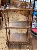 Victorian walnut three tier etagere with fretwork 3/4 gallery top and base drawer,
