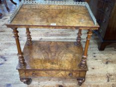 Victorian burr walnut two tier etagere with pierced brass 3/4 gallery top and base drawer,