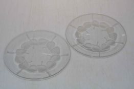 Two Lalique glass leaf design plates.