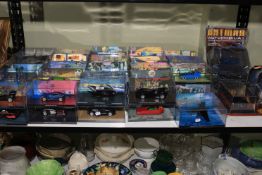 Collection of 48 boxed Batman related model vehicles, magazines, etc.
