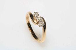 Diamond three stone 9 carat gold ring, size S.
