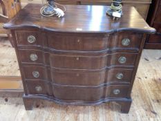 Mahogany shaped serpentine front chest of four long drawers on bracket feet, 74cm by 87cm by 49cm.