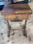 Victorian mahogany fold top work table having frieze drawer above deep sewing drawer raised on