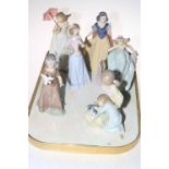 Collection of six Lladro figures including American Love 6153, Disney and Afternoon Promenade 7637.