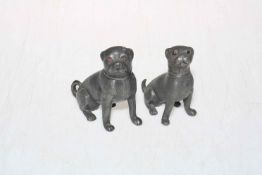 Pair metal dog pepperettes with glass eyes, 9cm.
