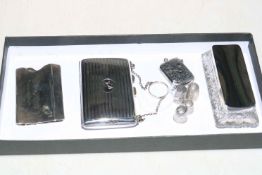 Silver items comprising, purse, Birmingham 1916, card case, vesta,