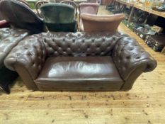 Brown buttoned leather drop end Chesterfield settee.