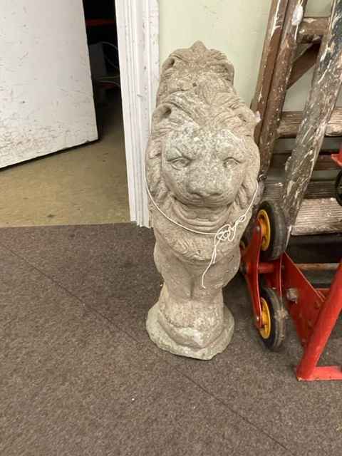 Pair weathered seated upright garden lions, 56cm.