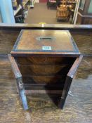 Walnut and ebony table cabinet of drawers with key, 24cm high.