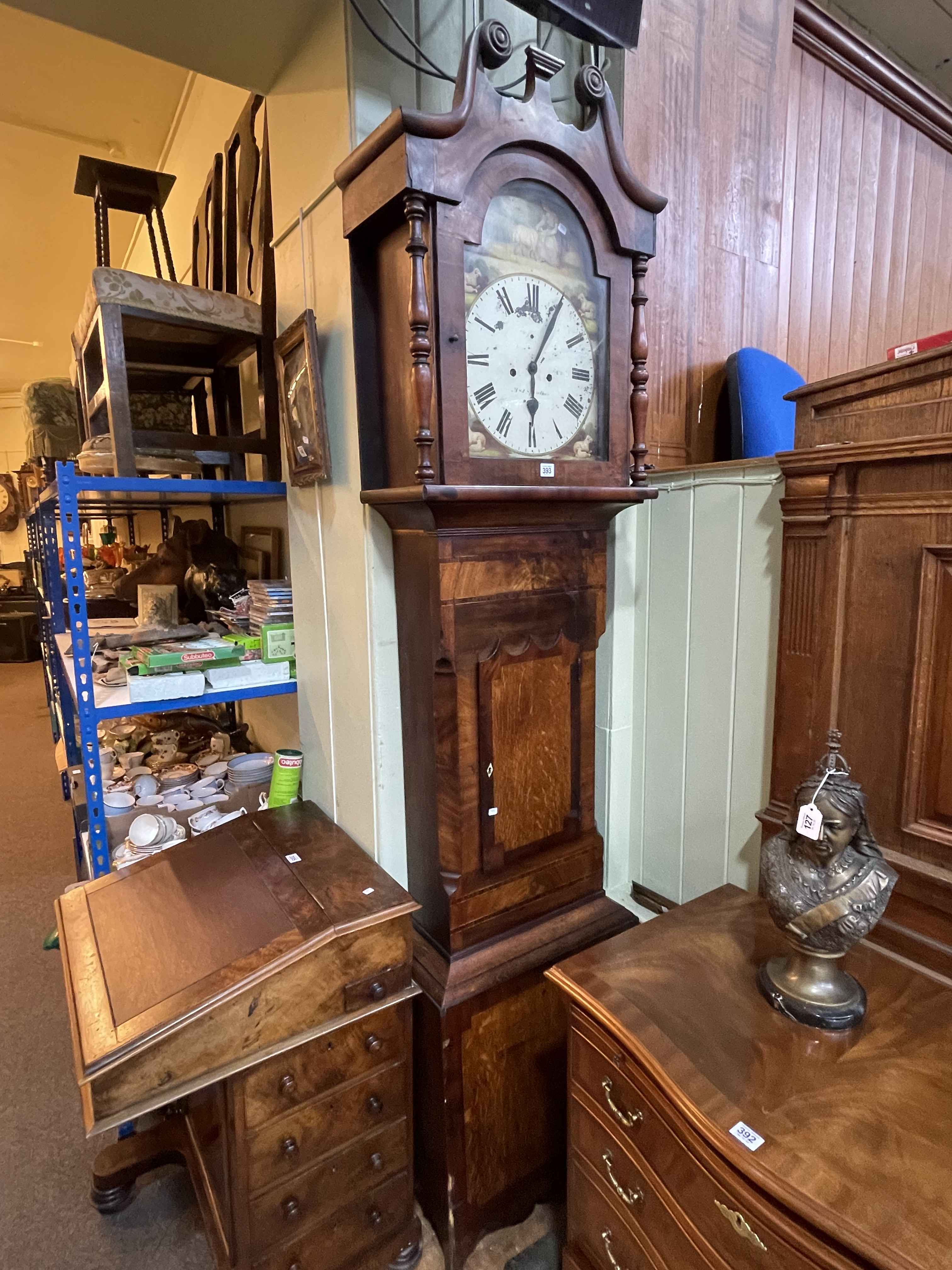 Antique oak and mahogany eight day longcase clock having painted arched dial.